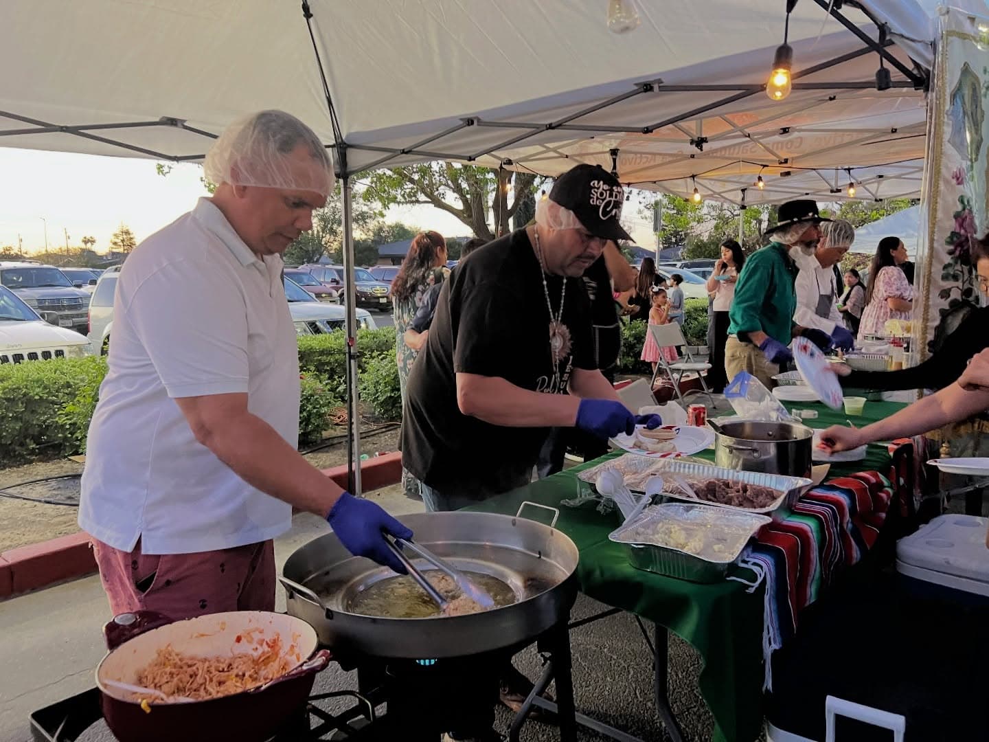 Volunteers preparing food for the festival