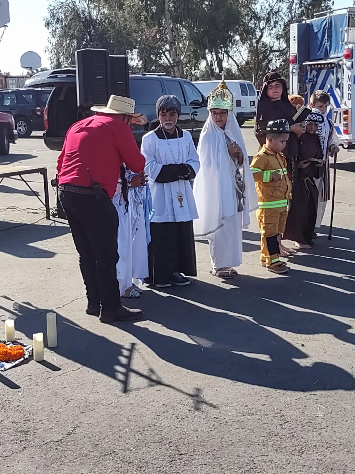 Children dressed as saints lined up for the Saint Dress-Up Contest